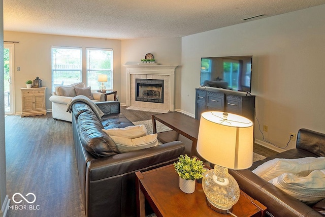 10316 Hatherley Way, Fishers, IN 46037 - living room with wood finished floors, plenty of natural light, and a textured ceiling