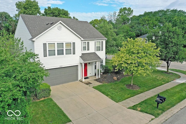 10316 Hatherley Way, Fishers, IN 46037 - traditional home with roof with shingles, driveway, an attached garage, and a front lawn