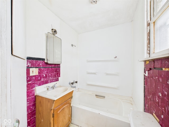 29 E Pine St, Anderson, IN 46012 - full bath featuring vanity, bathing tub / shower combination, and tile walls