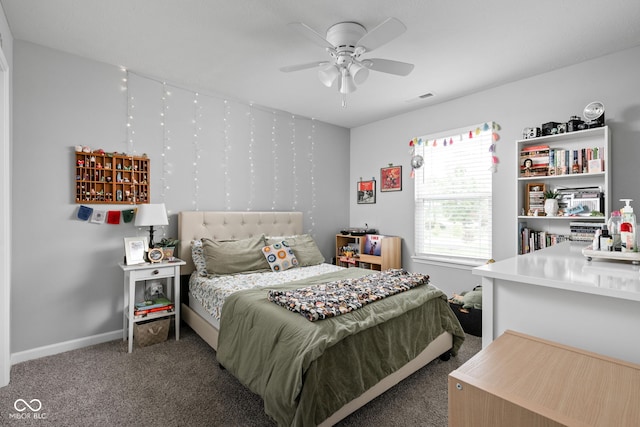 2542 Barstow Dr, Whitestown, IN 46075 - carpeted bedroom with baseboards and a ceiling fan