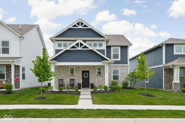 2542 Barstow Dr, Whitestown, IN 46075 - craftsman inspired home with stone siding and a front lawn