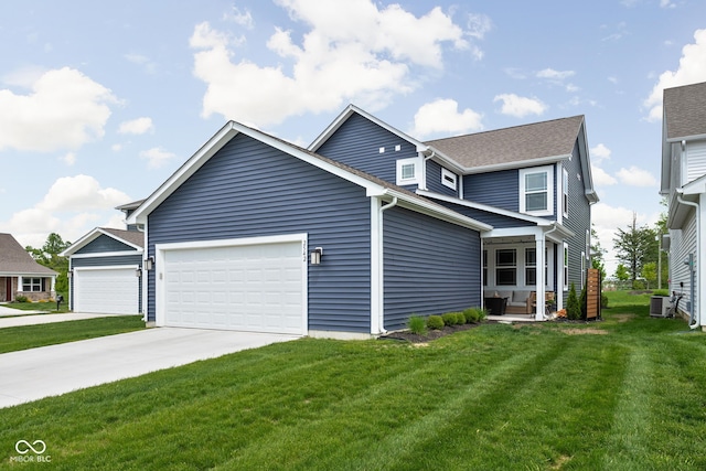 2542 Barstow Dr, Whitestown, IN 46075 - view of front of house with central AC unit, a front lawn, concrete driveway, and a garage