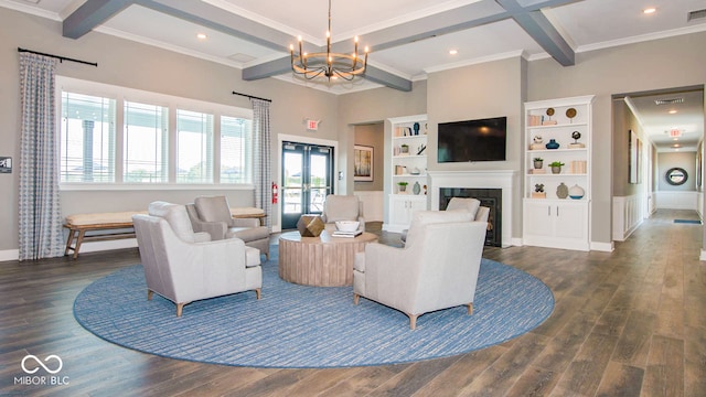2542 Barstow Dr, Whitestown, IN 46075 - living area featuring coffered ceiling, beam ceiling, dark wood-style floors, a fireplace, and a chandelier