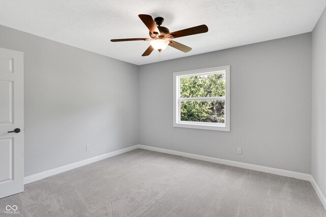 10602 Fall Rd, Fishers, IN 46037 - empty room with ceiling fan, light colored carpet, and baseboards