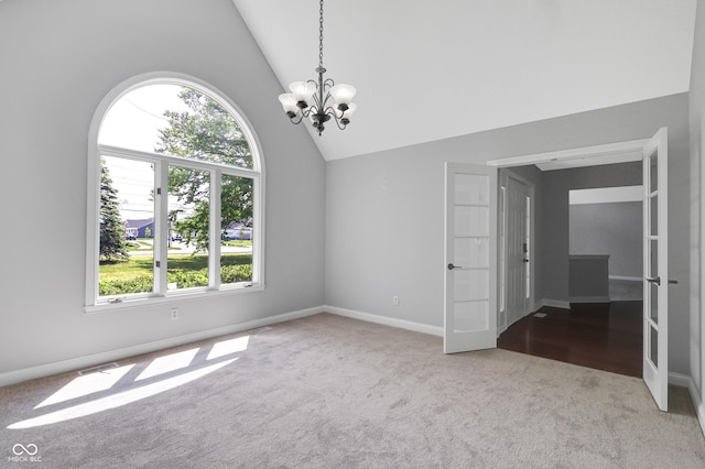 10602 Fall Rd, Fishers, IN 46037 - carpeted spare room with a chandelier, lofted ceiling, and baseboards