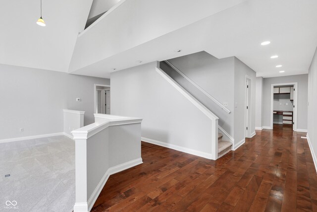 10602 Fall Rd, Fishers, IN 46037 - hallway featuring baseboards, wood finished floors, recessed lighting, and stairway