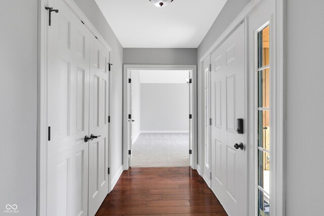 10602 Fall Rd, Fishers, IN 46037 - corridor with dark wood-type flooring and baseboards