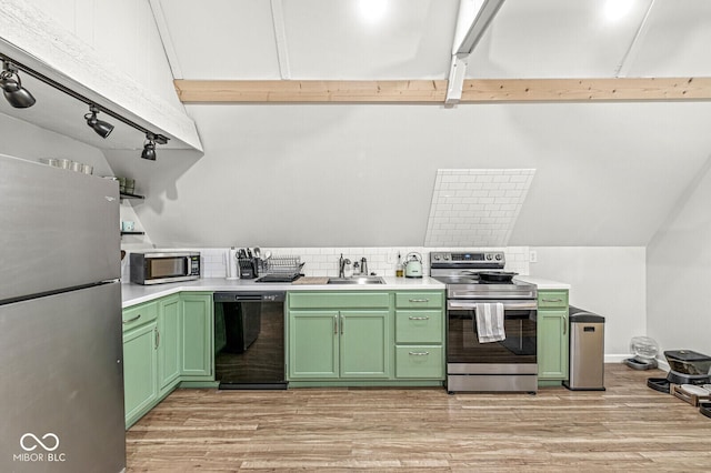 809 Iron Bridge Rd, Cicero, IN 46034 - kitchen with green cabinets, appliances with stainless steel finishes, a sink, light countertops, and light wood-type flooring