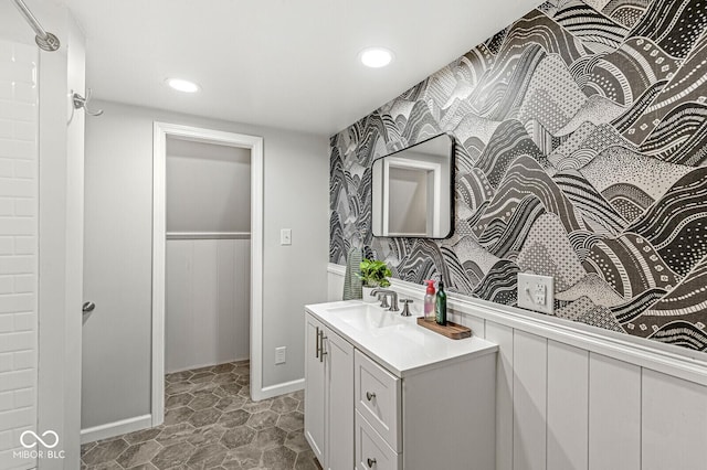809 Iron Bridge Rd, Cicero, IN 46034 - bathroom with vanity, a spacious closet, recessed lighting, and baseboards