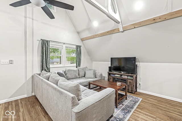 809 Iron Bridge Rd, Cicero, IN 46034 - living room with beamed ceiling, baseboards, a ceiling fan, wood finished floors, and high vaulted ceiling