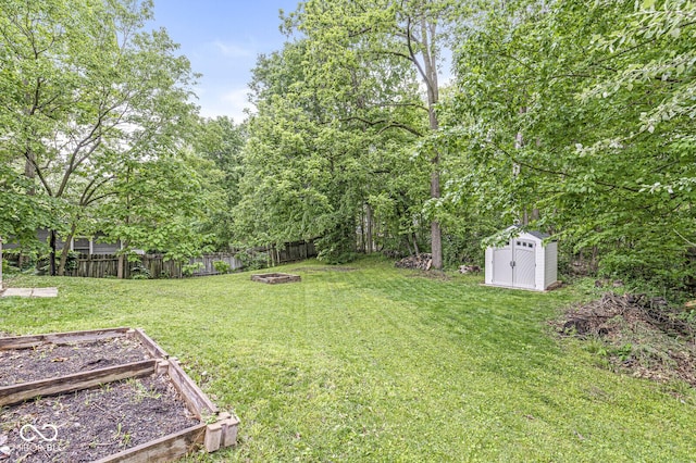 809 Iron Bridge Rd, Cicero, IN 46034 - view of yard featuring a fire pit and a vegetable garden