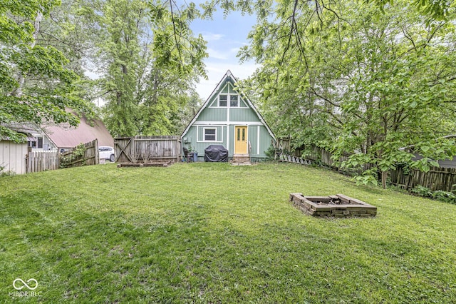 809 Iron Bridge Rd, Cicero, IN 46034 - rear view of property featuring a fire pit and entry steps