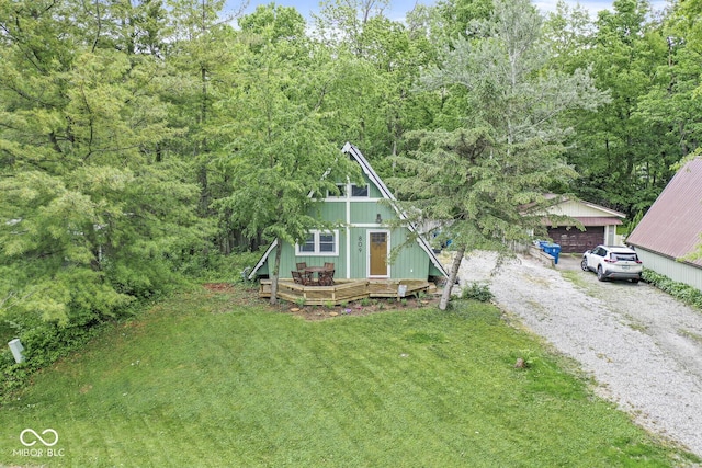809 Iron Bridge Rd, Cicero, IN 46034 - a-frame style home featuring a wooden deck, a detached garage, and a front yard
