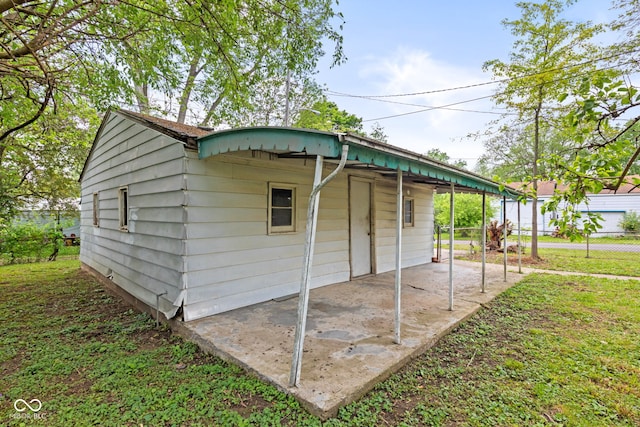 2321 W 26th St, Anderson, IN 46016 - view of outdoor structure with a carport
