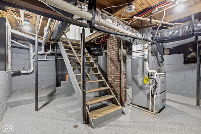 2321 W 26th St, Anderson, IN 46016 - unfinished below grade area with stairs and heating unit