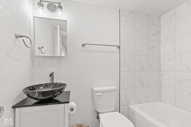 2321 W 26th St, Anderson, IN 46016 - full bathroom featuring toilet, vanity, and shower / tub combination