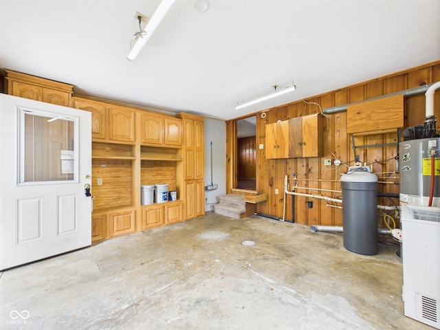 unfurnished living room featuring unfinished concrete flooring