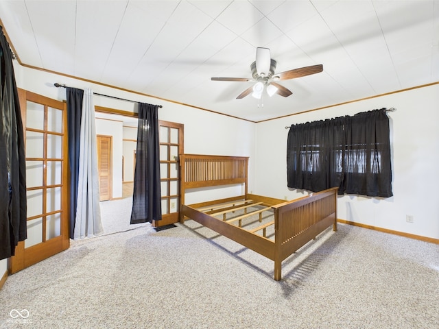 carpeted bedroom with baseboards