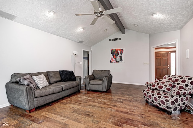 living room featuring hardwood / wood-style floors, baseboards, a textured ceiling, and ceiling fan