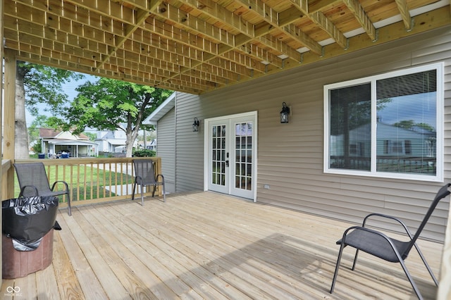 wooden deck featuring french doors