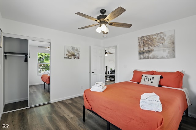 bedroom featuring wood finished floors, ceiling fan, baseboards, and a closet