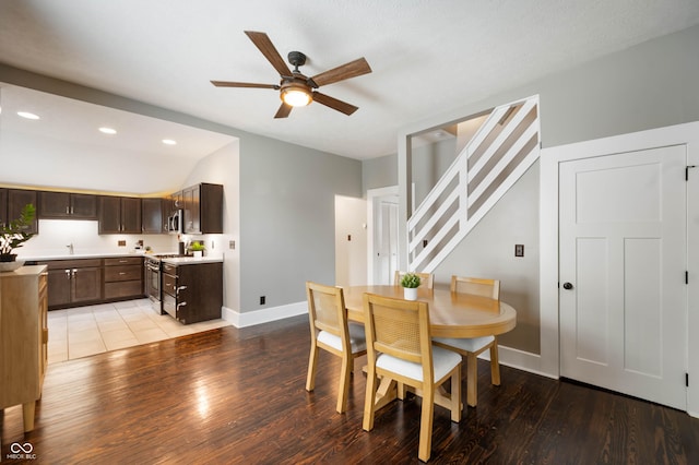 3019 W Huntsville Rd, Pendleton, IN 46064 - dining area with ceiling fan, baseboards, light wood finished floors, stairway, and recessed lighting