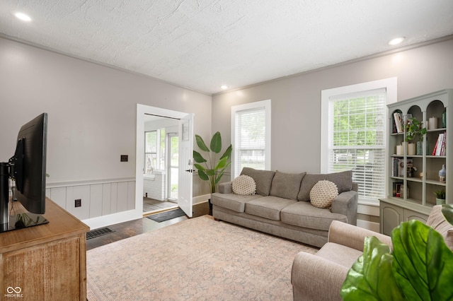 3019 W Huntsville Rd, Pendleton, IN 46064 - living area featuring wood finished floors, wainscoting, and recessed lighting