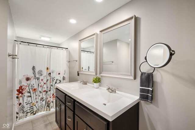3019 W Huntsville Rd, Pendleton, IN 46064 - full bath featuring double vanity, tile patterned flooring, curtained shower, and recessed lighting