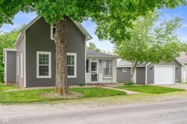 3019 W Huntsville Rd, Pendleton, IN 46064 - view of front of home featuring a garage and a front lawn