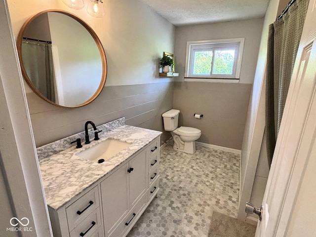 4105 N Cozy Hollow Ln, New Castle, IN 47362 - bathroom with vanity, a textured ceiling, and tile patterned floors