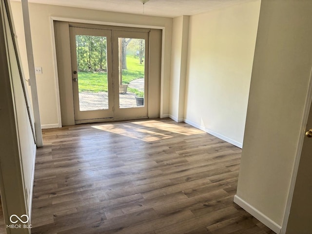 4105 N Cozy Hollow Ln, New Castle, IN 47362 - spare room featuring wood finished floors and baseboards