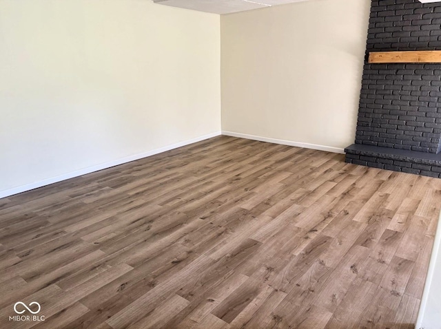 4105 N Cozy Hollow Ln, New Castle, IN 47362 - empty room with baseboards and wood finished floors