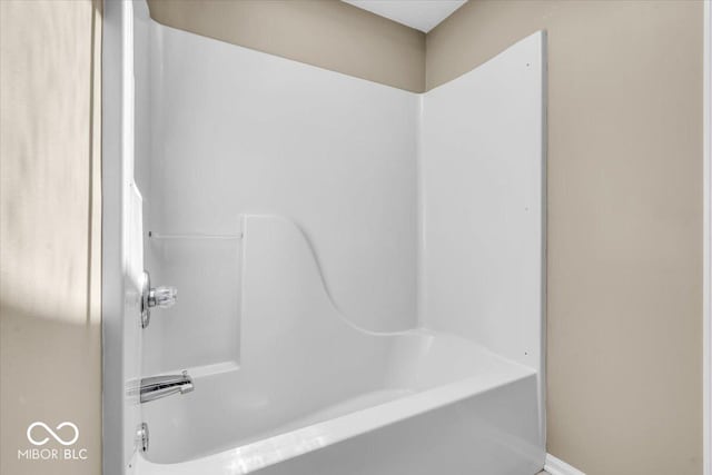 full bath featuring shower / washtub combination