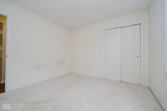 10833 Tournament Ln, Indianapolis, IN 46229 - unfurnished bedroom with carpet flooring and a closet