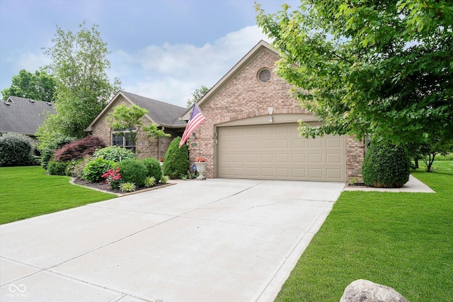 10833 Tournament Ln, Indianapolis, IN 46229 - view of front of house featuring a garage, brick siding, concrete driveway, and a front yard