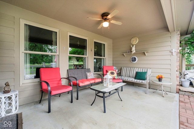 10833 Tournament Ln, Indianapolis, IN 46229 - view of patio featuring a ceiling fan and outdoor lounge area