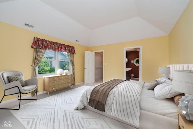 10833 Tournament Ln, Indianapolis, IN 46229 - carpeted bedroom featuring lofted ceiling, a walk in closet, and a closet