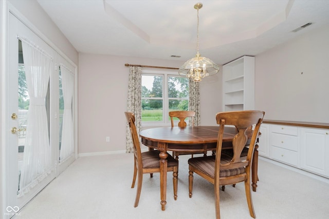 10833 Tournament Ln, Indianapolis, IN 46229 - dining space featuring a chandelier and light carpet