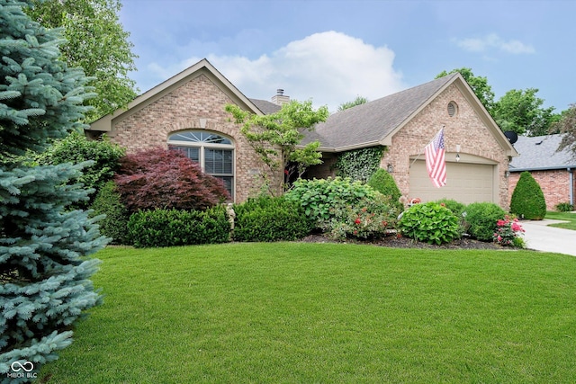 10833 Tournament Ln, Indianapolis, IN 46229 - view of front of home featuring brick siding, an attached garage, and a front lawn