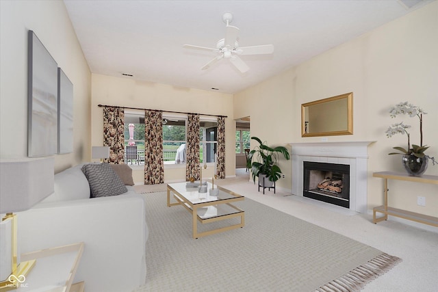 10833 Tournament Ln, Indianapolis, IN 46229 - living room with carpet, a tile fireplace, and a ceiling fan