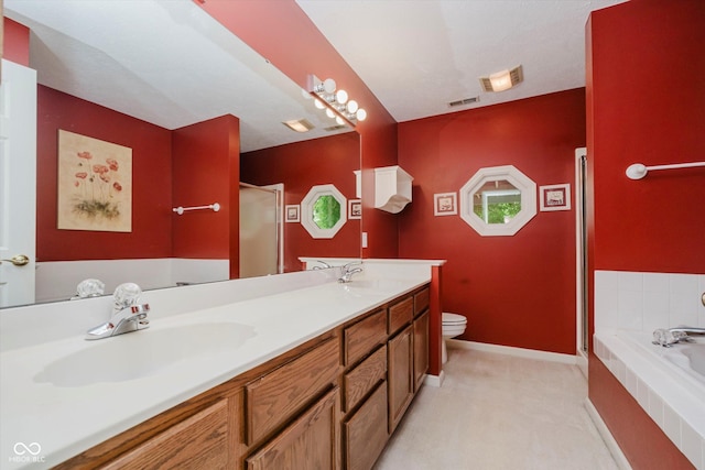 10833 Tournament Ln, Indianapolis, IN 46229 - full bath with double vanity, a bath, and a stall shower
