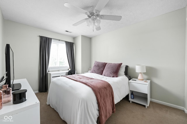 9404 Enclave Dr Unit D, Avon, IN 46123 - bedroom featuring light carpet, a textured ceiling, and a ceiling fan