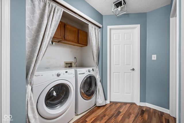 9404 Enclave Dr Unit D, Avon, IN 46123 - washroom featuring cabinet space, separate washer and dryer, dark wood finished floors, and a textured ceiling