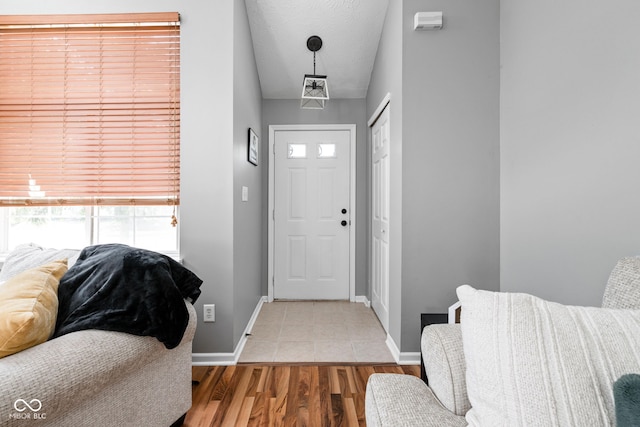 9404 Enclave Dr Unit D, Avon, IN 46123 - foyer featuring baseboards and wood finished floors