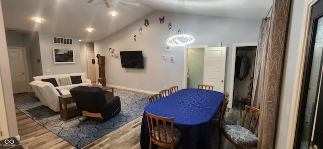 5415 S Chalmers Ct, Bloomington, IN 47403 - living room featuring a ceiling fan, wood finished floors, baseboards, and high vaulted ceiling