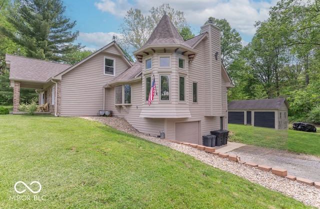 1409 S Northview Dr, Martinsville, IN 46151 - view of front of home featuring a chimney, a garage, a shingled roof, and a front lawn
