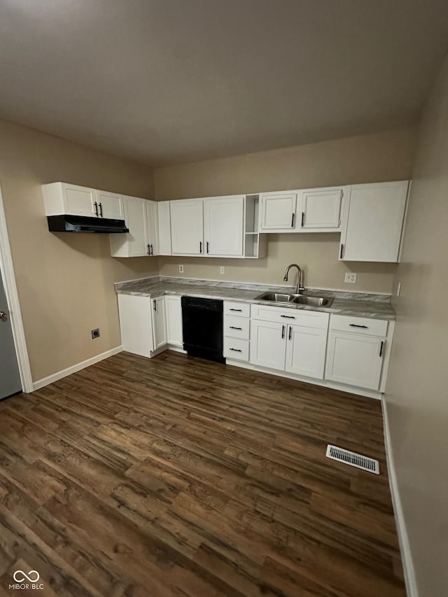 kitchen featuring black dishwasher, a sink, white cabinets, baseboards, and dark wood finished floors