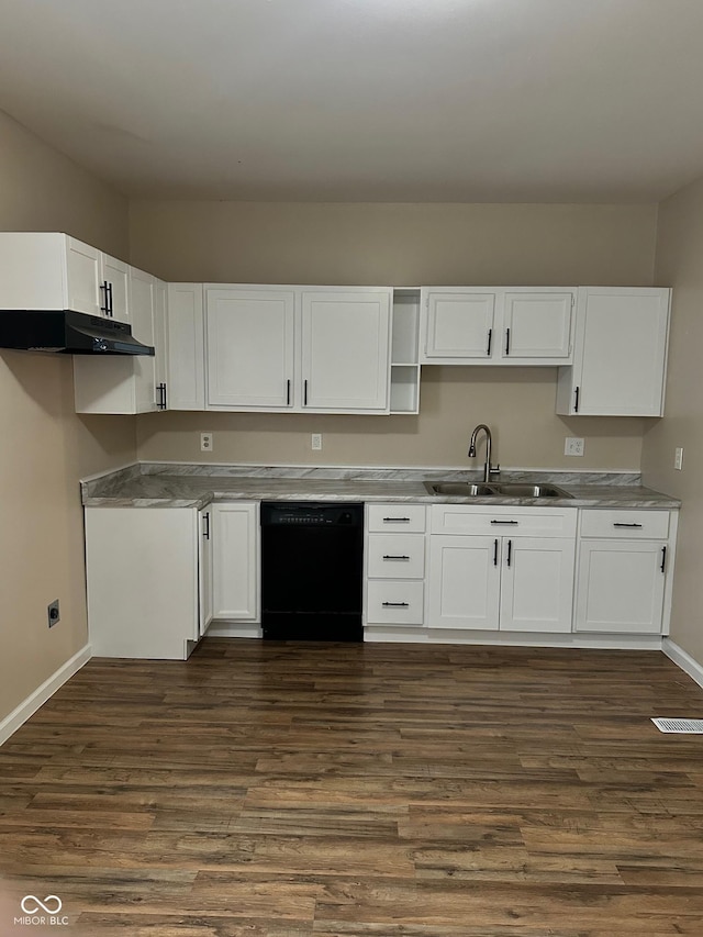 kitchen with black dishwasher, a sink, under cabinet range hood, and white cabinets