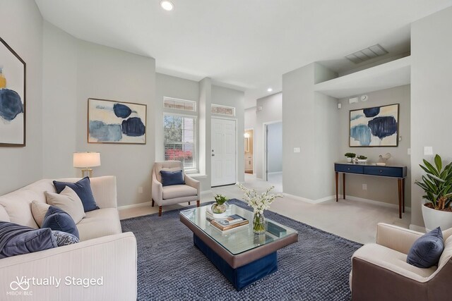 living room with carpet, baseboards, and recessed lighting