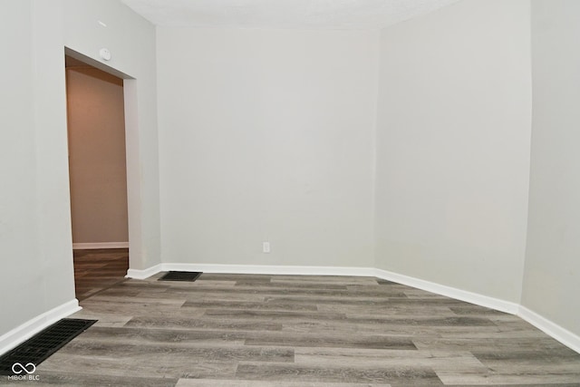 623 Orange St, Indianapolis, IN 46203 - empty room featuring wood finished floors and baseboards